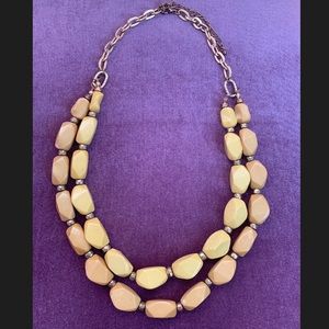 Yellow plastic bead necklace